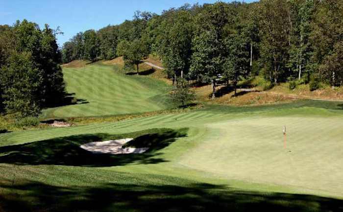 A view of the sloping fairway and green at the third hole. (Photo: David Droschak)